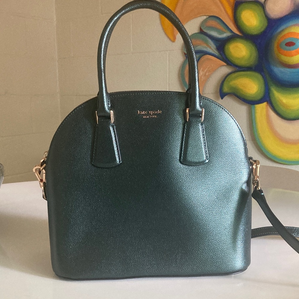 Kate Spade Sylvia Dome Satchel, in metallic green.